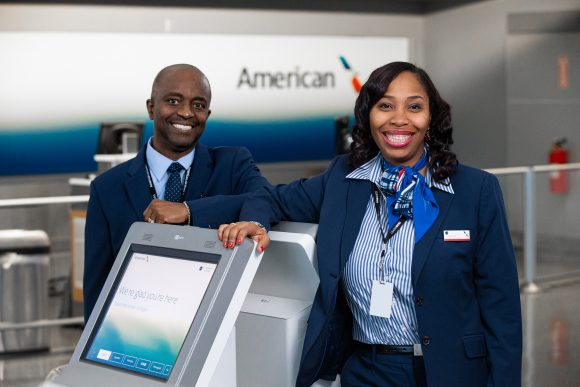 AA Gate agents at kiosk
