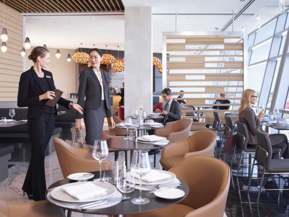 AdmiralsClub-customer-being-shown-to-table